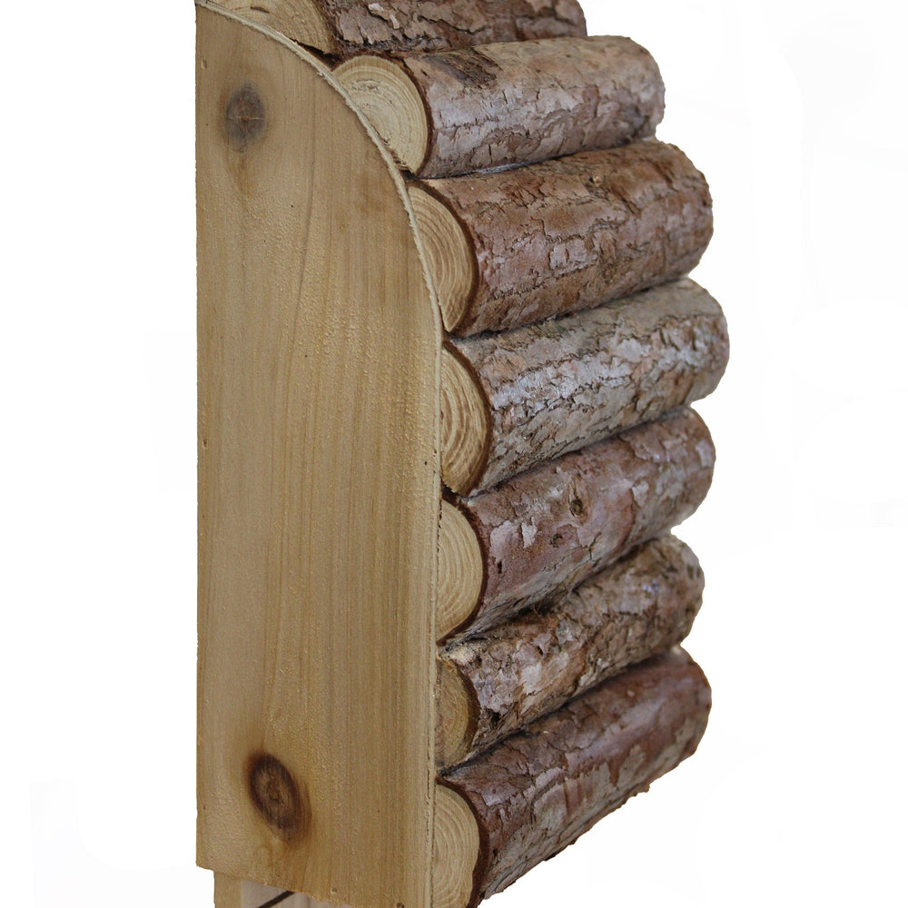 A bat box with bark on a white background