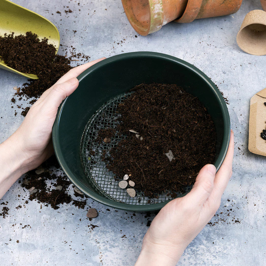garden sieve on greenhouse bench