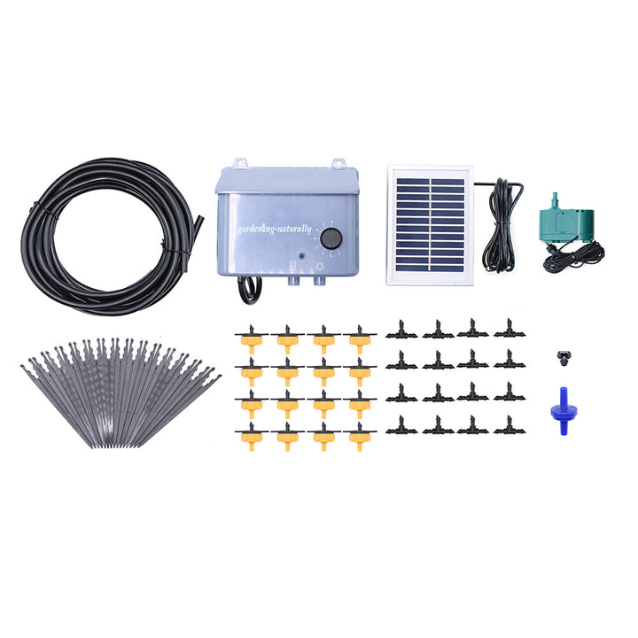 Solar-powered irrigation system kit with components on a white background