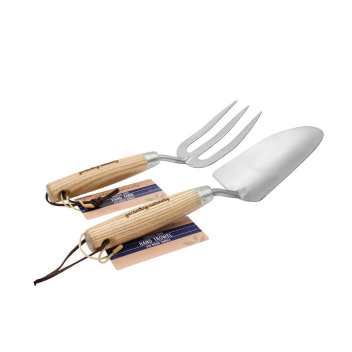 Gardening tools with wooden handles on a white background