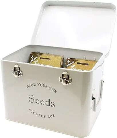 Grey seed tin on a white background the seed tin has seed packets in it