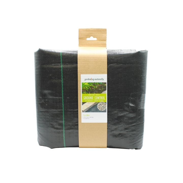 A folded black ground control weed barrier sheet.