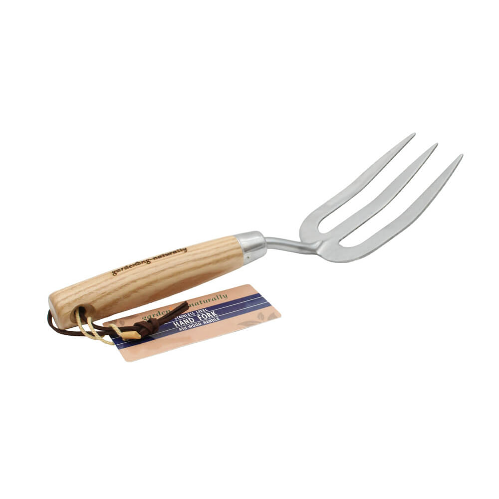 Gardening fork with wooden handle on a white background