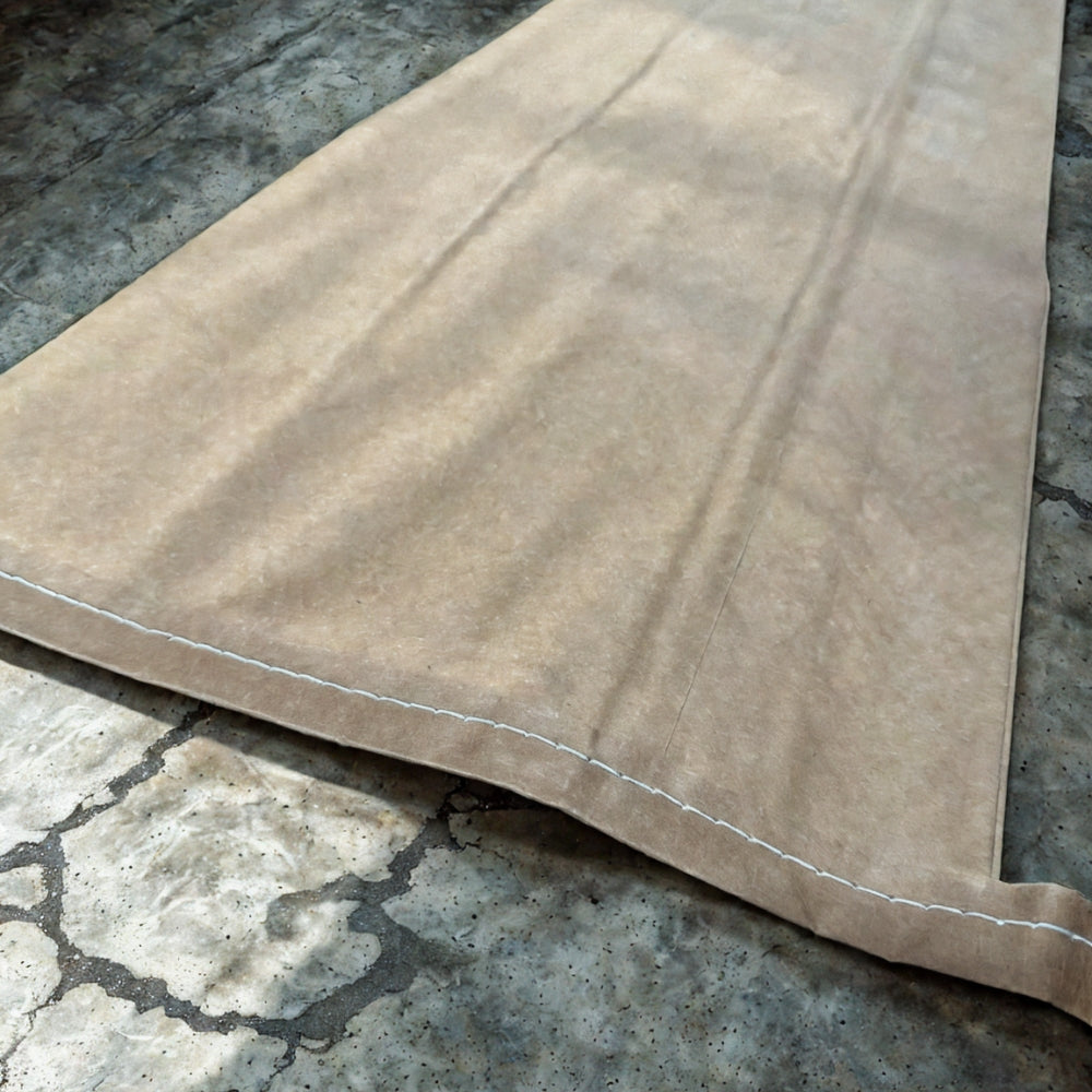Paper potato sack laid flat on concrete