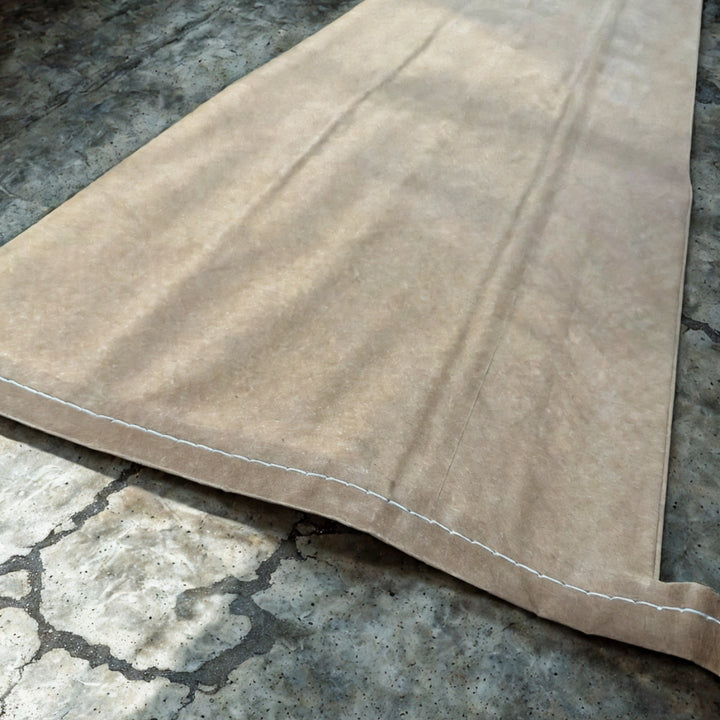 Paper potato sack laid flat on concrete