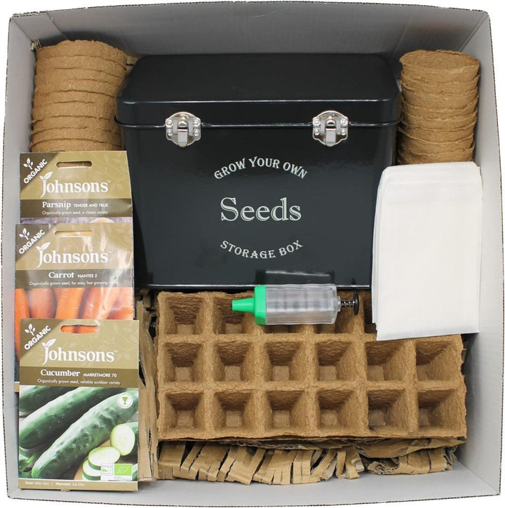 A gift set containing a black seed storage box with a red lid, white seed dividers