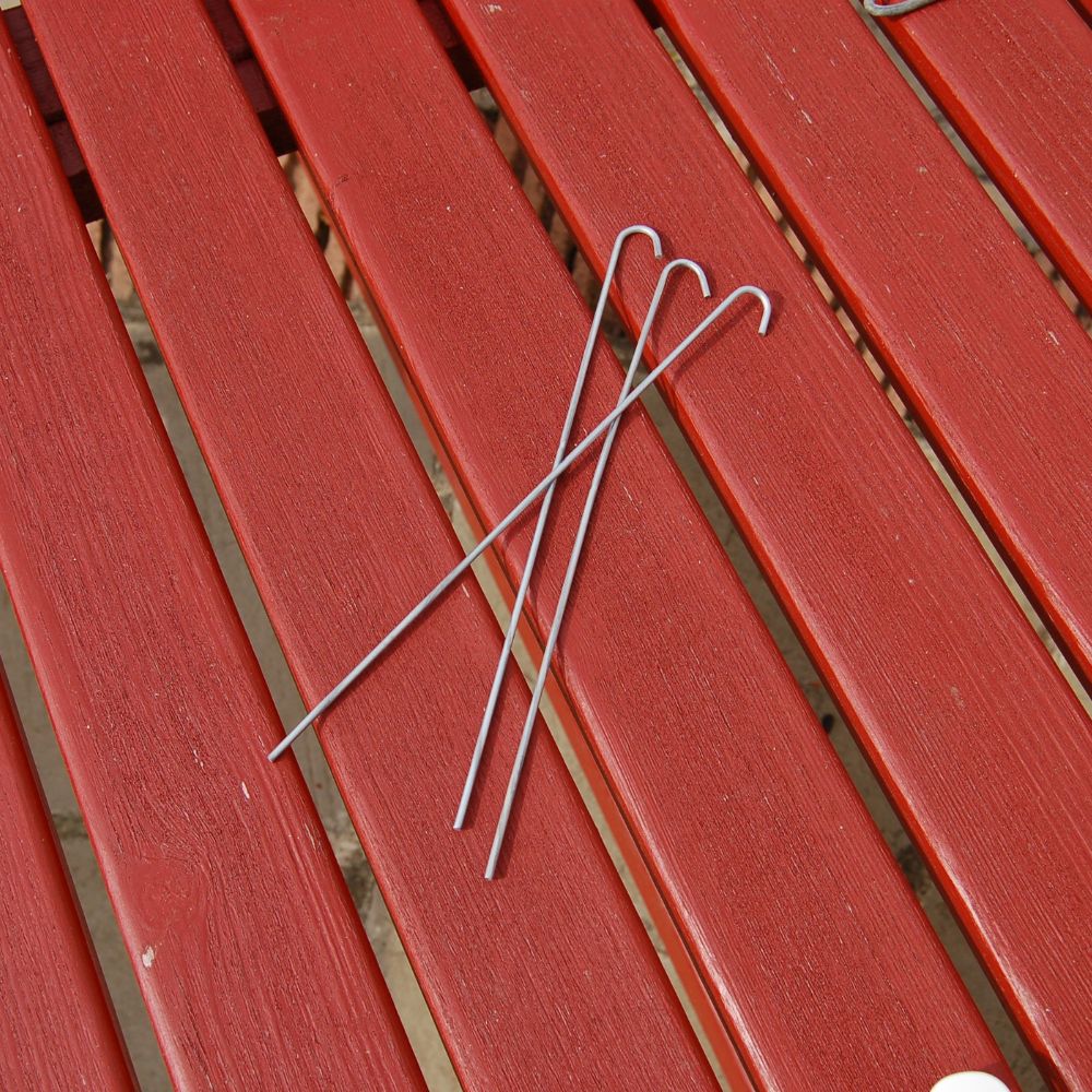 steel pegs on bench