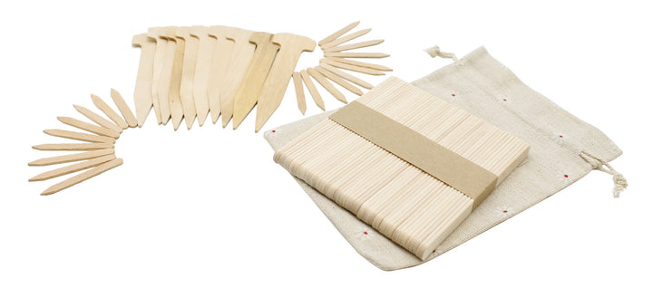 white woven drawstring bag with variety of wooden plant labels