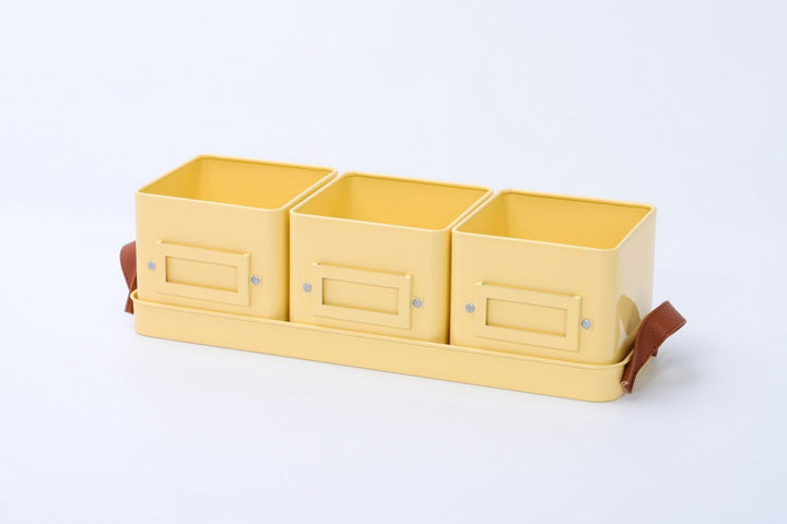 yellow herb pots